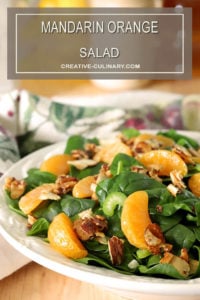 Mandarin Orange Salad with Candied Almonds Served on White Plate