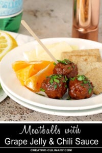 Appetizer Plate of Meatballs, Fruit, Crackers, and Cheese