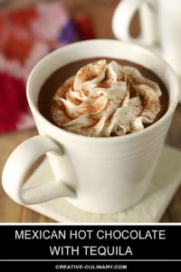 Mexican Hot Chocolate with Tequila Served in a White Mug with Whipped Cream on Top