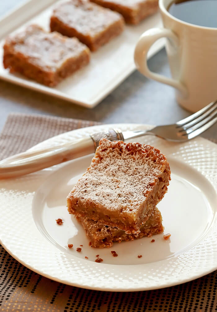 Milk Pie Bars from Momofuku Stacked on a Round Plate for Serving