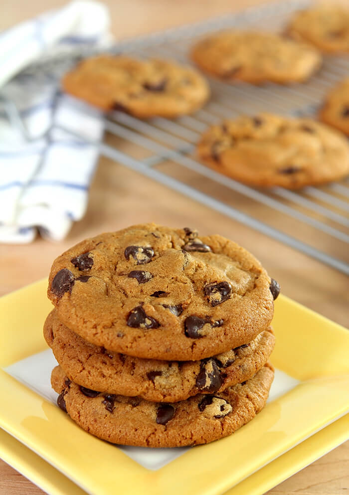 Stack of Molasses and Brown Butter Chocolate Chip Cookies on Yellow Plate