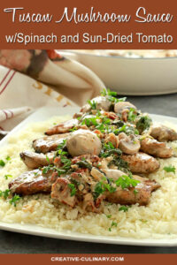 Tuscan Mushroom Sauce with Spinach and Sun-Dried Tomato Served on Chicken and Rice