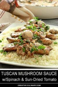 Tuscan Mushroom Sauce with Spinach and Sun-Dried Tomato Served on Chicken and Rice