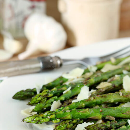 Grilled Asparagus with Garlic and Parmesan Cheese on a Serving Dish