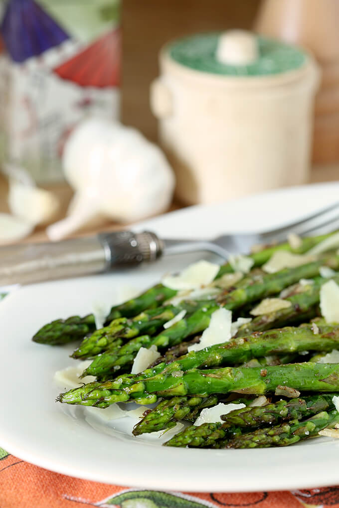 Grilled Asparagus with Garlic and Parmesan Cheese on a Serving Dish