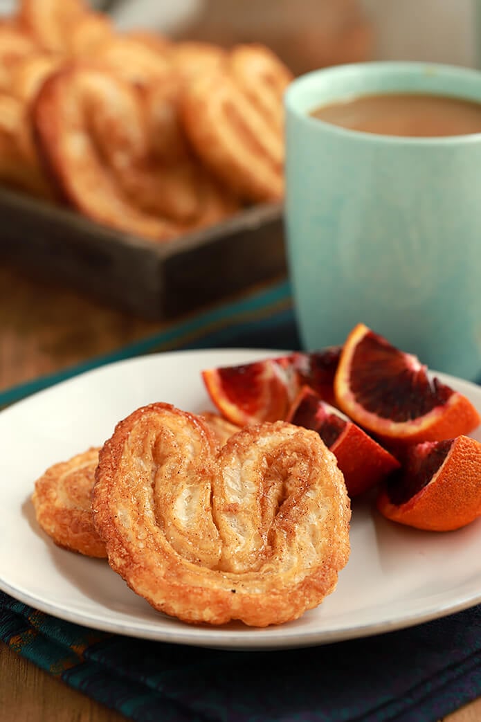 Orejas - A Mexican Pan Dulce Served on a Plate with Blood Oranges