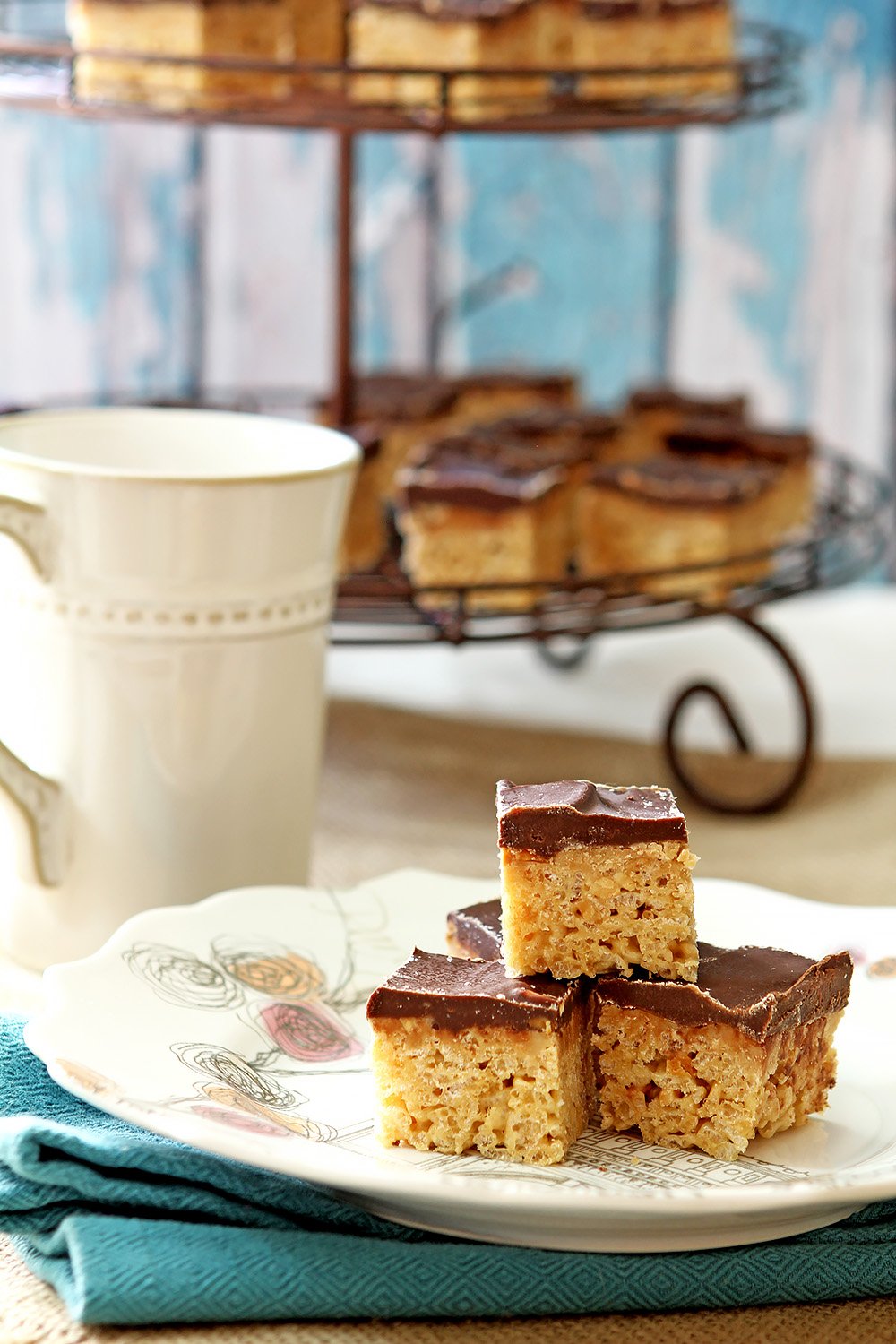 Plate of Peanut Butter Cup Rice Krispies stacked.