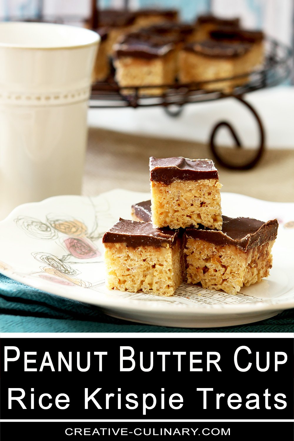 Peanut Butter Cup Rice Krispies stacked on a white plate with a turquoise napkin.