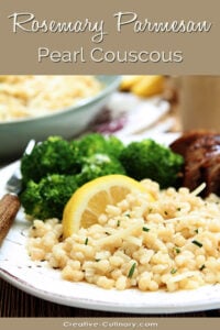 Rosemary Parmesan Couscous Served with Broccoli and Garnished with a Lemon Wedge