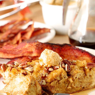 Pumpkin Pecan Overnight French Toast Closeup Served with Bacon on the Side