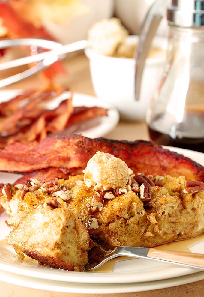 Pumpkin Pecan Overnight French Toast Closeup Served with Bacon on the Side