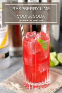 Raspberry Lime Vodka Soda Garnished with Lime Wedge