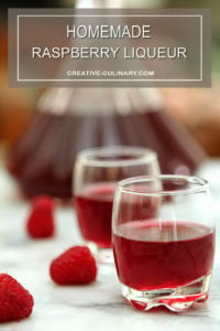 Homemade Raspberry Liqueur Served in Short Liqueur Glasses