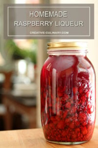 Homemade Raspberry Liqueur in a Large Mason Jar