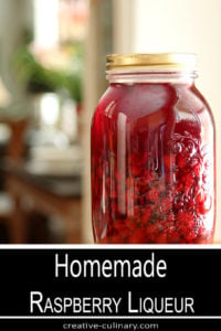 Homemade Raspberry Liqueur in a Large Mason Jar