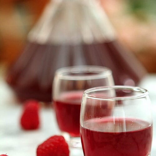 Homemade Raspberry Liqueur Served in small apertif glasses.