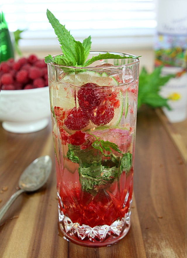 Raspberry Vodka Mojito Cocktail with Mint Garnish Served in a Tom Collins Glass