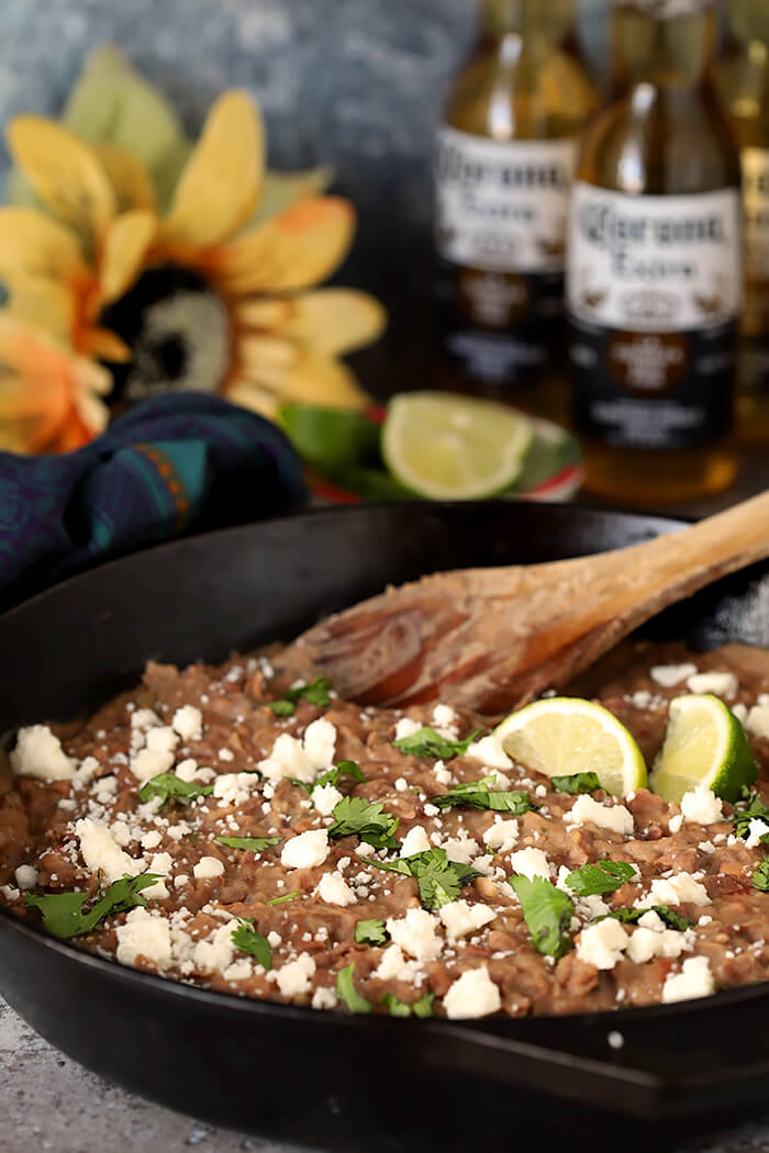 Cast Iron Skillet with The Best Re-Fried Beans with Bacon