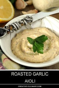 Roasted Garlic Aioli in Dressing Dish with Decorated Knife