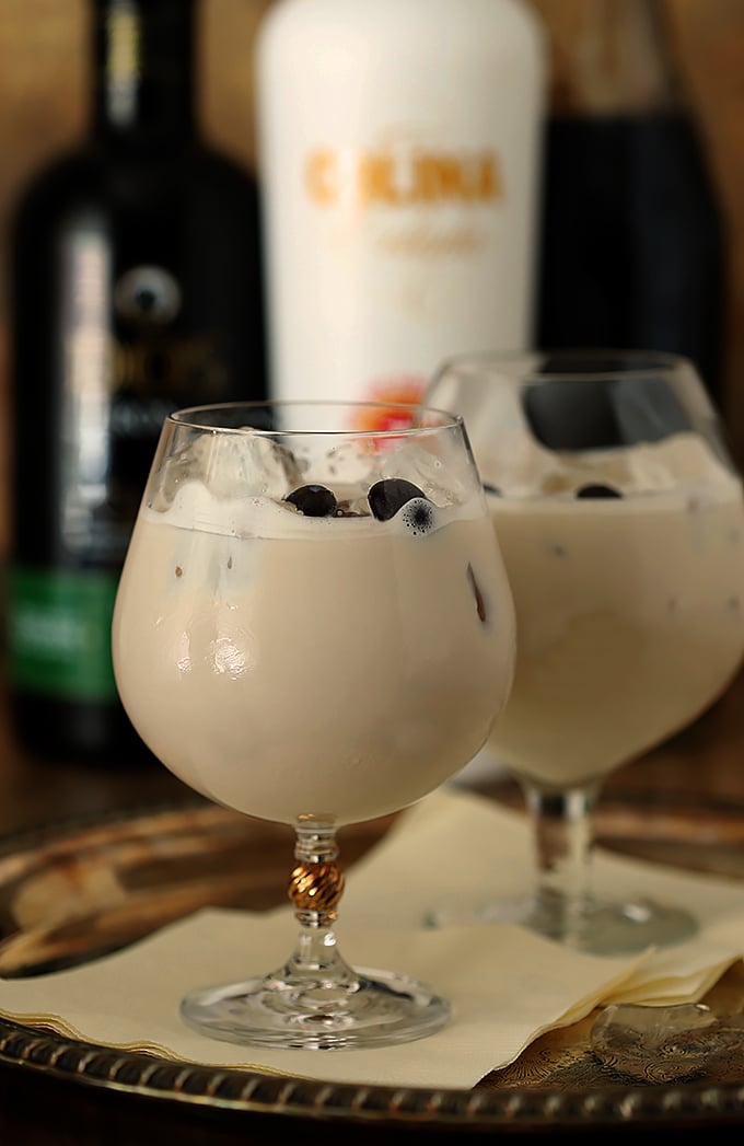 Rum Colada on the Rocks in Two Glasses on Serving Tray