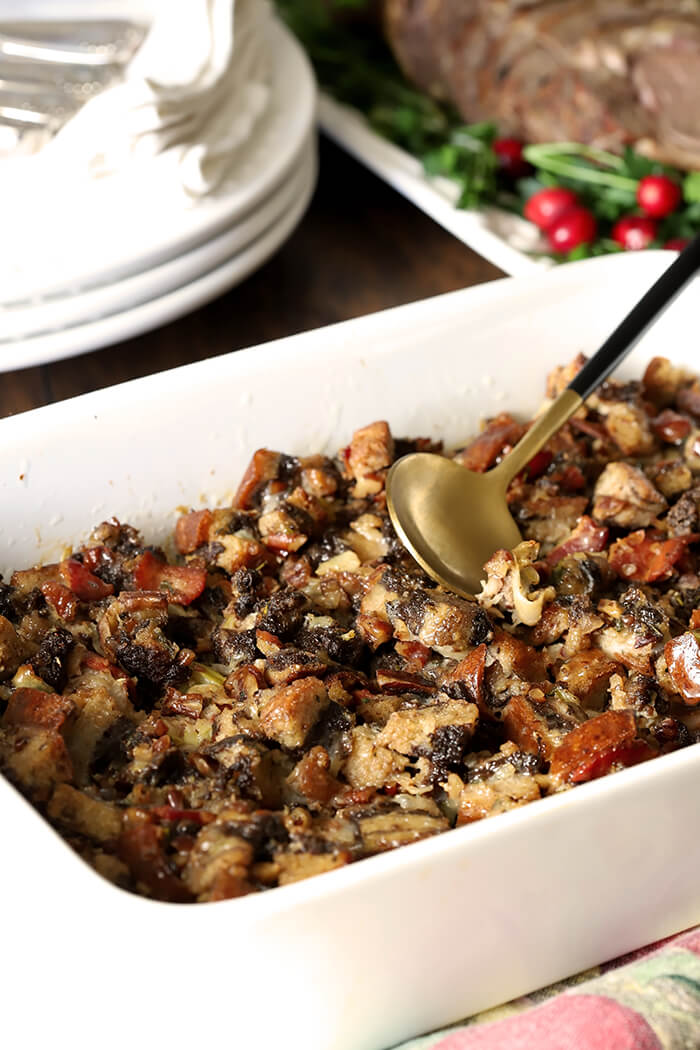 Pumpernickel Dressing with Bourbon and Pecans in a White Serving Bowl