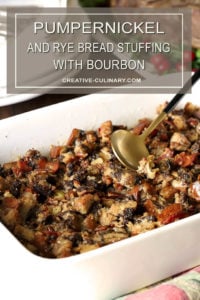 Pumpernickel and Rye Dressing with Pecans and Bourbon in a Rectangular White Serving Dish