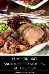 Pumpernickel and Rye Dressing with Pecans and Bourbon Served on a White Plate with Peas, Cranberry Sauce, and Lamb Garnished with Thyme