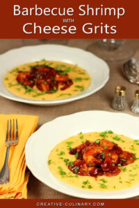 Barbecue Shrimp with Cheese Grits Served in a White Bowl and Garnished with Parsley