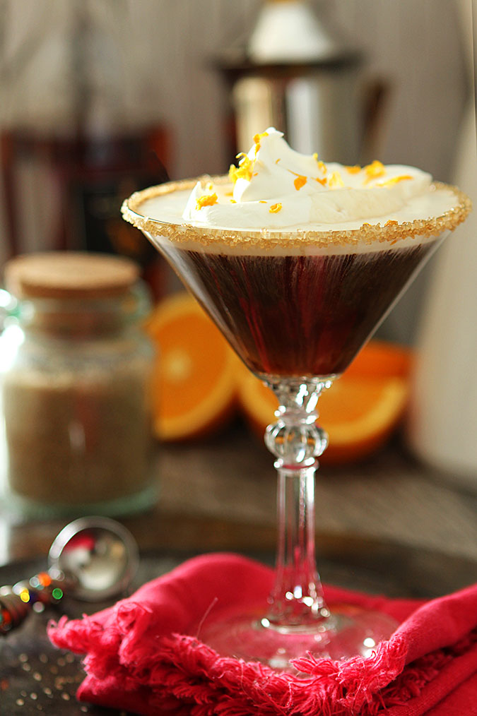 Spanish Coffee with Brandy topped with whipped cream and garnished with orange zest.