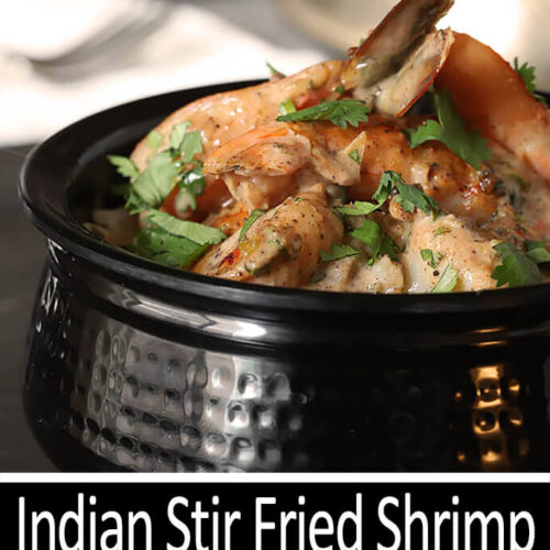 Indian Stir Fried Shrimp in a Tomato Cream Sauce in an Authentic Indian Black Bowl