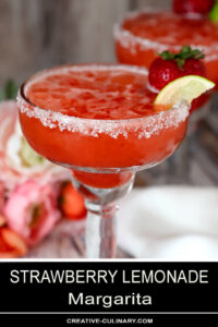 Strawberry Lemonade Margarita Garnished with a Strawberry and Lime Wedge