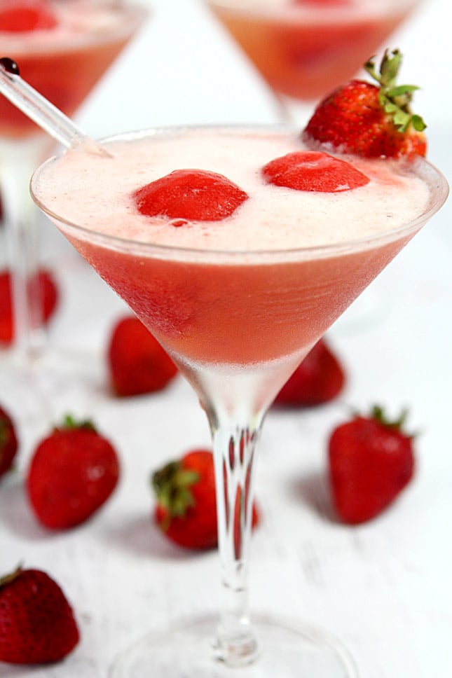 Sparkling Strawberry Sorbet Cocktail combines homemade sherbet with chilled prosecco in a martini glass.