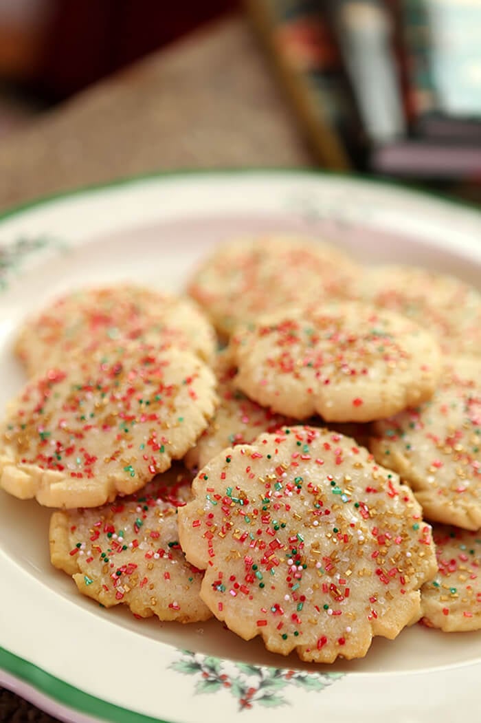 The Best Sugar Cookies Decorated with Red, Green, and Gold Sugar Crystals for Christmas