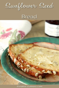 Buttered Slices of Sunflower Seed Bread on Green Plate