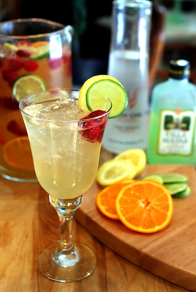 Vodka Limoncello Sangria with Raspberries Served in a Wine Glass